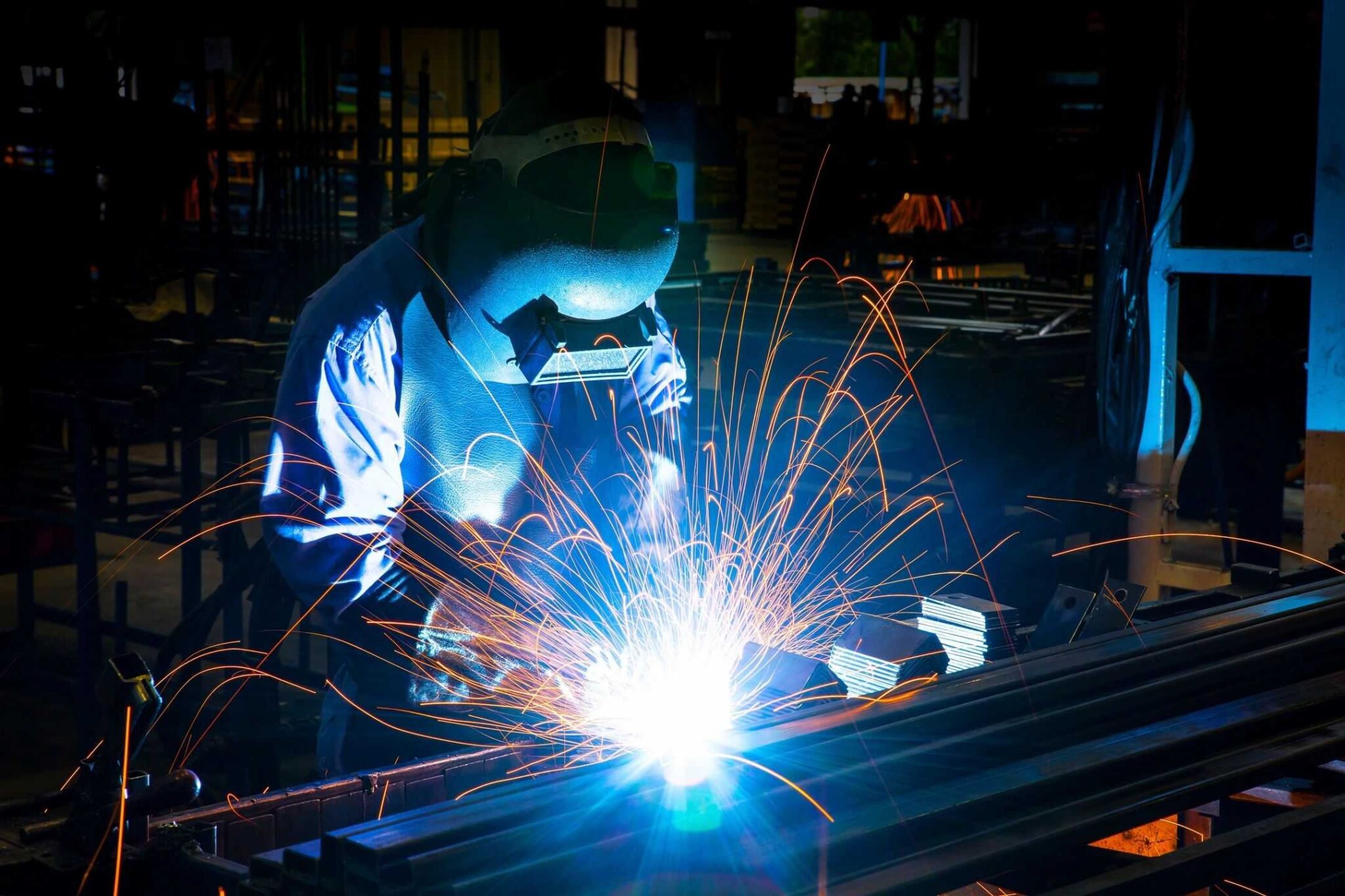 Skilled welder at work in AMI Manufacturing facility